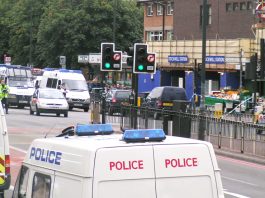 Huge police presence outside Stockwell tube station in south London yesterday after the police shoot