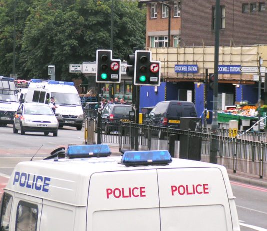 Huge police presence outside Stockwell tube station in south London yesterday after the police shoot