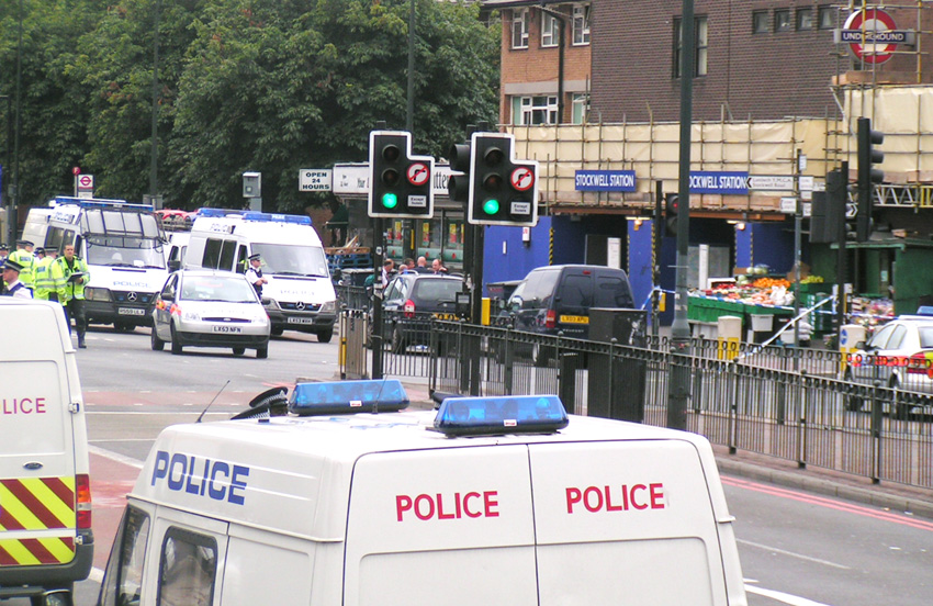 Huge police presence outside Stockwell tube station in south London yesterday after the police shoot