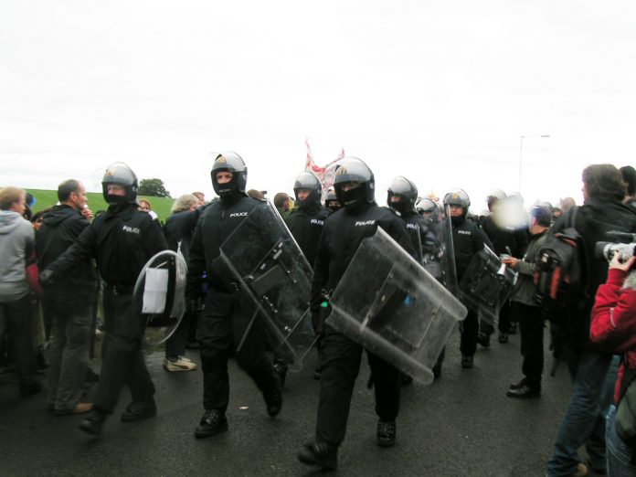 Police with riot gear used against peaceful protesters at Gleneagles – armed police have been deploy