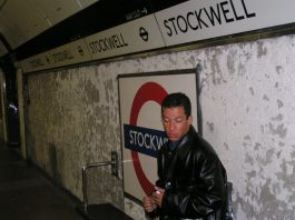 Alex Alessandro Pereira, cousin of Jean Charles de Menezes grieves on the platform at Stockwell Tube station on Sunday 24th July two days after his cousin was murdered by police