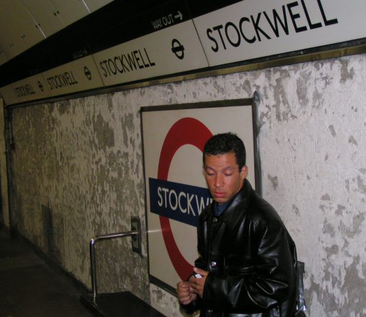 Alex Alessandro Pereira, cousin of Jean Charles de Menezes grieves on the platform at Stockwell Tube station on Sunday 24th July two days after his cousin was murdered by police