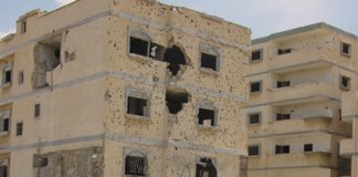 Palestinian flats in Rafah full of shell and bullet holes because of Israeli army shelling