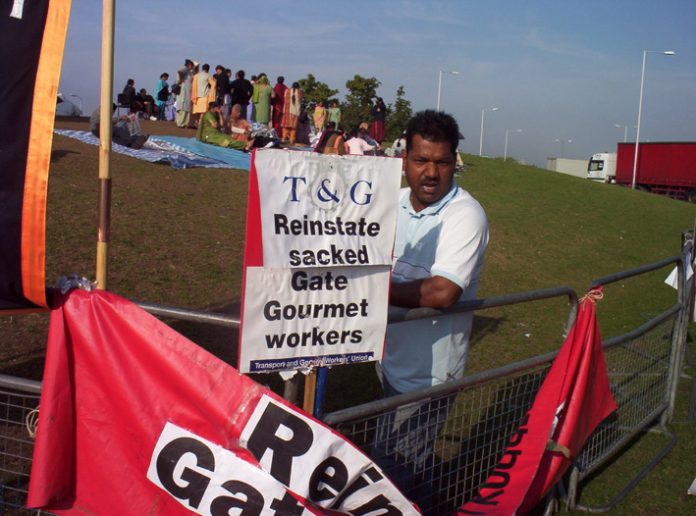 Gate Gourmet sacked workers on the picket line, angry at their union leaders who are cringing before the management