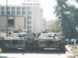 PRISONERS ‘TREATED LIKE ANIMALS’ alleges Human Rights Watch and NAACP US tanks block the road in central Baghdad