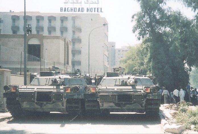 US tanks block the road in central Baghdad