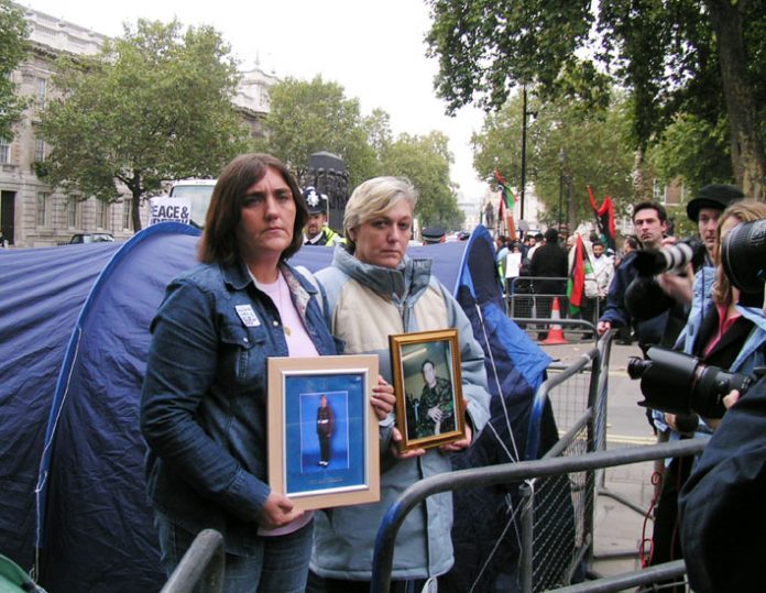 ROSE GENTLE and SUSAN SMITH at the start of their Peace Camp outside Downing Street yesterday afternoon