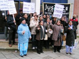 Locked-out Gate Gourmet workers outside the TGWU executive meeting on Tuesday morning