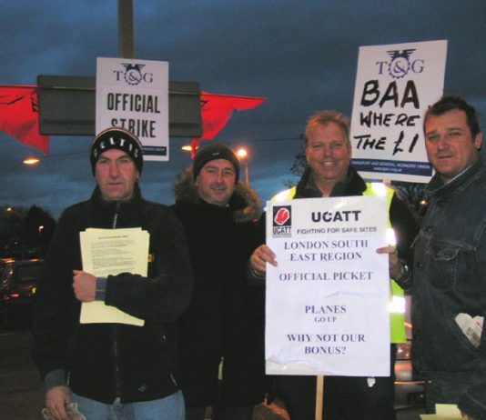 Terminal 5 building workers on the picket line early yesterday morning outside Hatton Cross tube