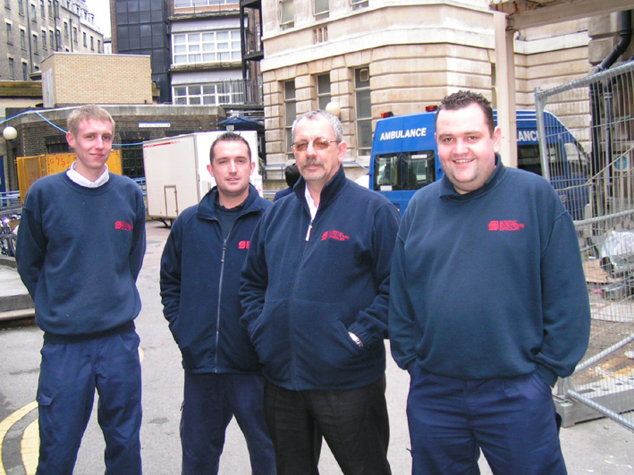 CHRIS KAVANAGH (right) with fellow fire alarm engineers, they called for the TUC to act to defend the NHS
