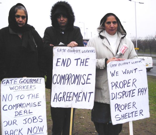 Gate Gourmet locked-out workers on the picket line at the Beacon roundabout at Heathrow yesterday