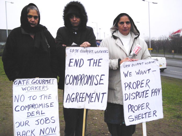 Gate Gourmet locked-out workers on the picket line at the Beacon roundabout at Heathrow yesterday