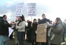 William Westwell (second from right) with a placard showing support for the locked-out workers from his Camden UNISON branch