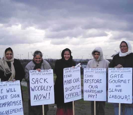 Determined Gate Gourmet locked out workers brave the cold weather yesterday on the picket line at Heathrow
