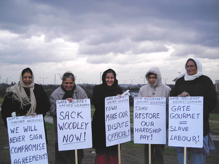 Determined Gate Gourmet locked out workers brave the cold weather yesterday on the picket line at Heathrow