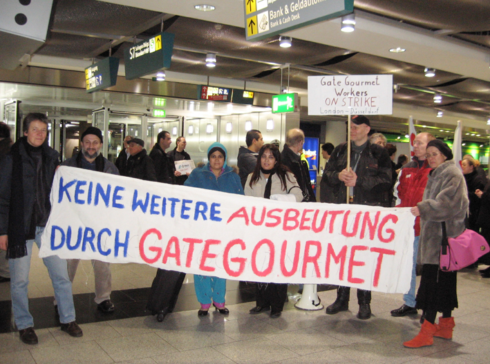 Two Gate Gourmet  locked-out workers from London’s Heathrow airport were given a warm reception at Dusseldorf airport on Wednesday when they visited striking local Gate Gourmet workers