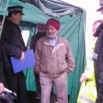 Police forcing the  Gate Gourmet locked-out workers to dismantle their tent and quit picketing Beacon Hill, Heathrow Airport after Gate Gourmet and the TGWU told the police that the dispute was over