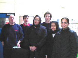 Gate Gourmet locked-out workers with firefighters during their campaign for support earlier in the week