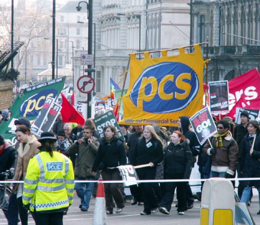 PCS  banners on last Saturday’s march to mark the third anniversary of the war on Iraq