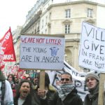 French youth with placards made by English language students marching through Paris on Thursday March 16