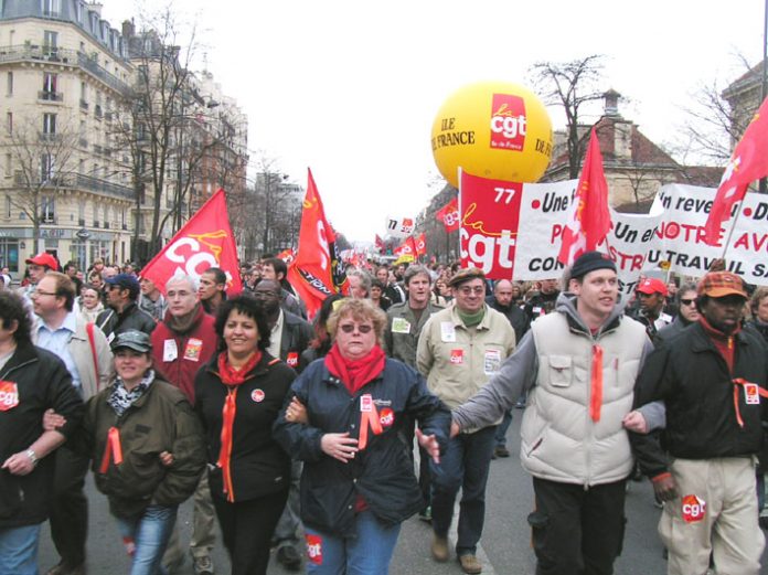 Members of the CGT, France’s largest trade union federation, arrive at Place d’Italie at the end of Tuesday’s demonstration