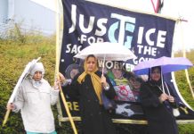 Locked-out Gate Gourmet workers picketing the company at Heathrow yesterday, despite the bad weather and police threats to arrest them