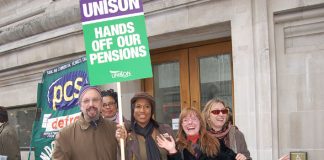 Striking local government workers on March 28 determined to defend their pensions