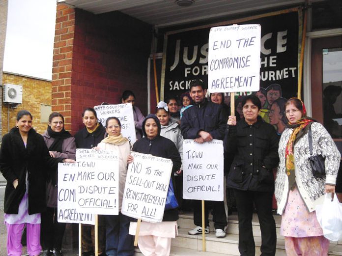 Gate Gourmet locked-out workers at a lobby of the Hillingdon TGWU office earlier this month