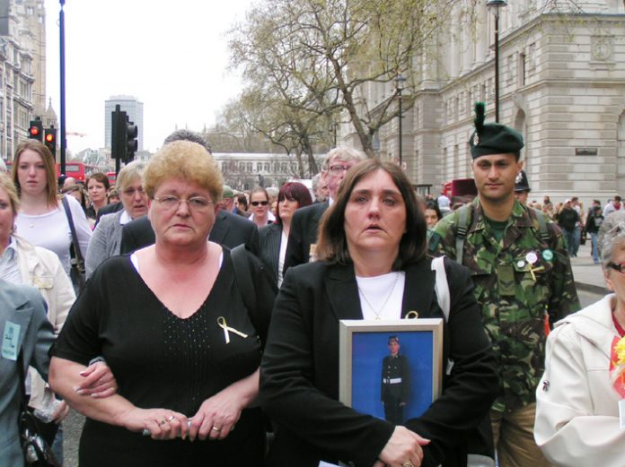 ROSE GENTLE (centre, right) leading the group from Military Families Against the War to the Cenotaph