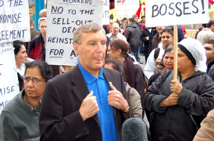 TGWU leader TONY WOODLEY is confronted by the locked-out Gate Gourmet workers at the start of Monday’s May Day march