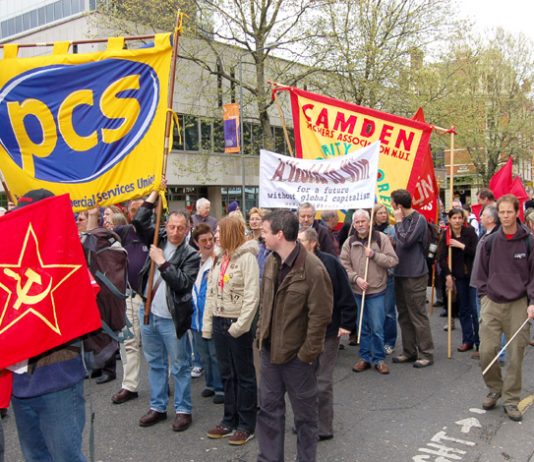 PCS banner on the May Day demonstration in London – PCS members were on strike last week against thousands of job cuts engineered by Brown