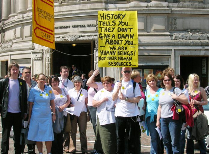 Nurses outside Central Halls on Thursday being reminded about one of the lessons of history
