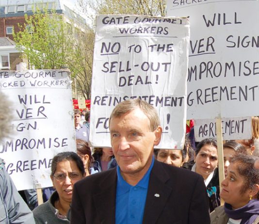 TGWU leader TONY WOODLEY surrounded by locked out Gate Gourmet workers at the May Day demonstration in London