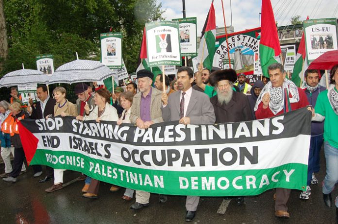 Front banner on the 5,000-strong  Free Palestine demonstration in London on Saturday