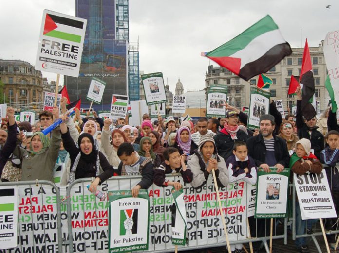 Youth at the front of Saturday’s ‘Stop Starving the Palestinians’ rally in Trafalgar Square following the 5,000-strong march