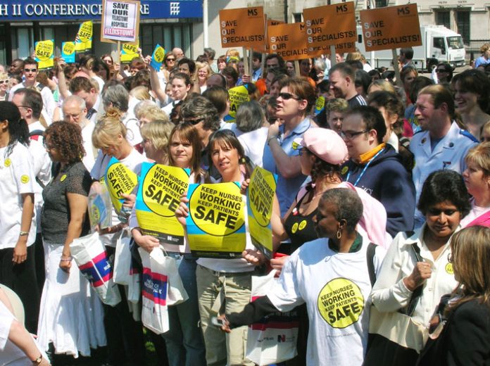 Nurses defending the NHS against bed cuts and hospital closures on May 6 when they lobbied parliament