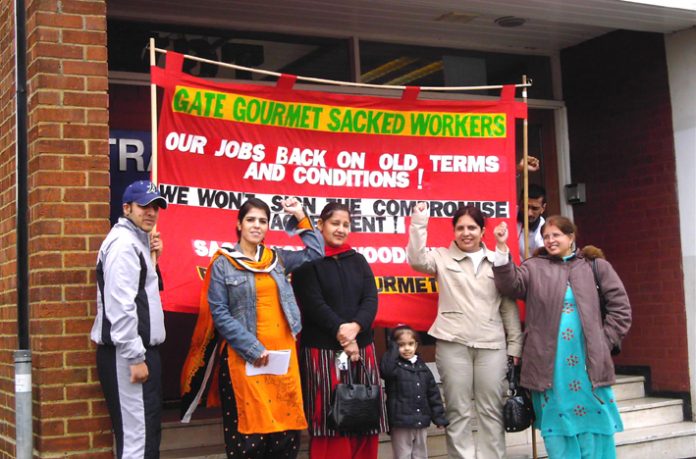 Gate Gourmet locked-out workers picketing TGWU office at Hillingdon yesterday demanding after 10 months that their dispute be made official and that they receive dispute pay