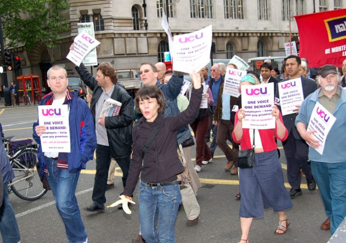 Newly formed University and College Union members on their solidarity march yesterday