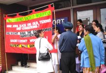 Gate Gourmet locked-out workers yesterday angrily confronting their TGWU convenor Dhillon, outside the Hillingdon TGWU office demanding that their dispute must be made official and that they must also receive dispute pay