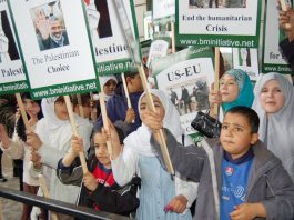 Abbas To Force Through Referendum On Recognising Israel Children on the May 20th London ‘Stop Starving the Palestinians’ demonstration with placards supporting the Hamas victory in the elections