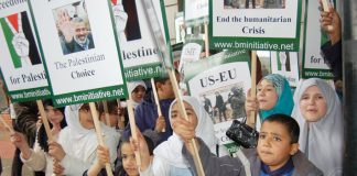 Children on the May 20th London ‘Stop Starving the Palestinians’ demonstration with placards supporting the Hamas victory in the elections