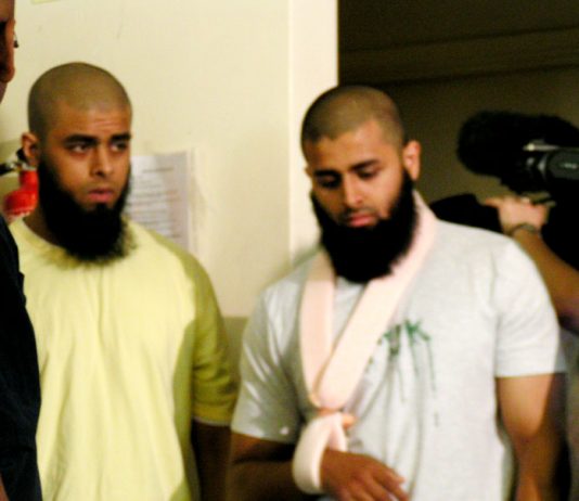 ABUL KOYAIR and his wounded brother MOHAMMED ABDUL KAHAR after giving a press conference in Forest Gate yesterday