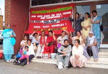 Gate Gourmet locked-out workers at the TGWU office yesterday demanding that all locked-out workers get hardship pay