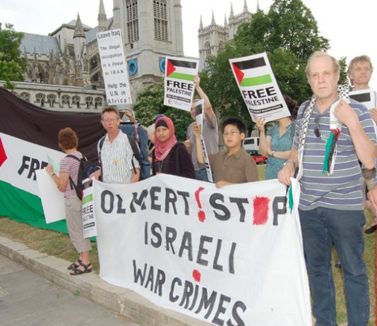 Demonstrators condemn Israel outside the Houses of Parliament on Friday evening