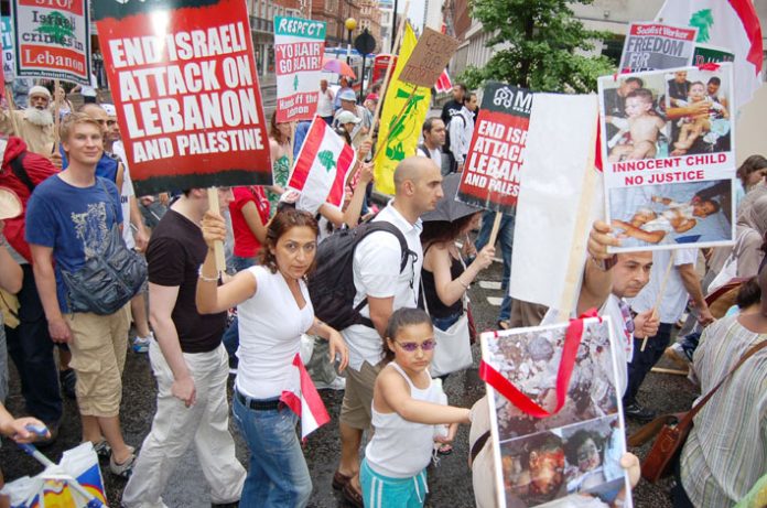 A section of the many thousands of marchers who demonstrated outside the American embassy in London last Saturday in support of Hezbollah and against the Israeli attack on the Lebanon