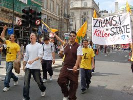 Youth denouncing the ‘Zionist killer state’ marching in London on Saturday’s 100,000-strong demonstration against the Israeli aggression