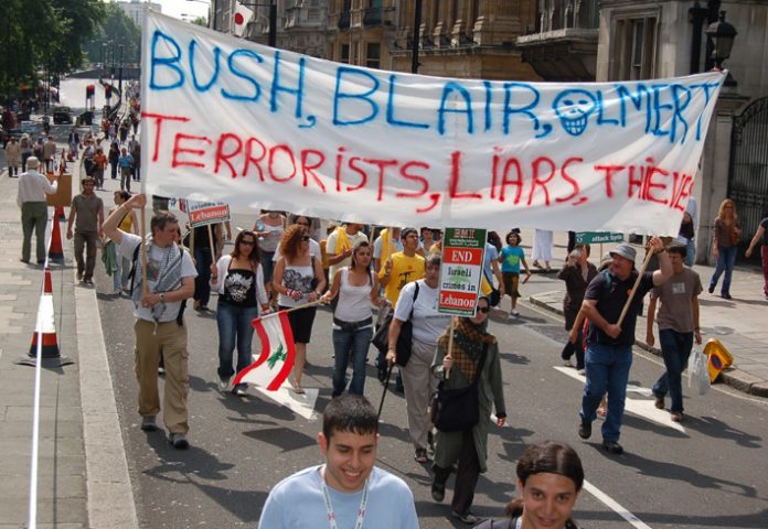 Demonstrators on last Saturday’s 100,000-strong demonstration through central London characterise the leaders of the imperialist alliance