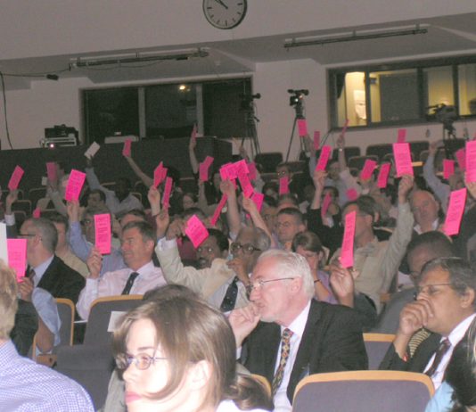 Doctors at the British Medical Association Annual Representative Meeting in June voting to keep privateers out of the NHS
