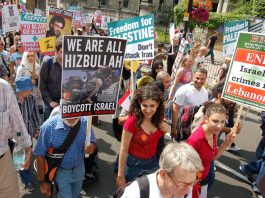 HEZBOLLAH ‘JIHAD FOR CONSTRUCTION’ – dispenses £10,000 for each destroyed home in Baalbek Marchers in London on August 5th against Israel’s attack on Lebanon show their support for Hezbollah