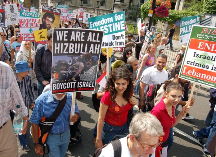 Marchers in London on August 5th against Israel’s attack on Lebanon show their support for Hezbollah